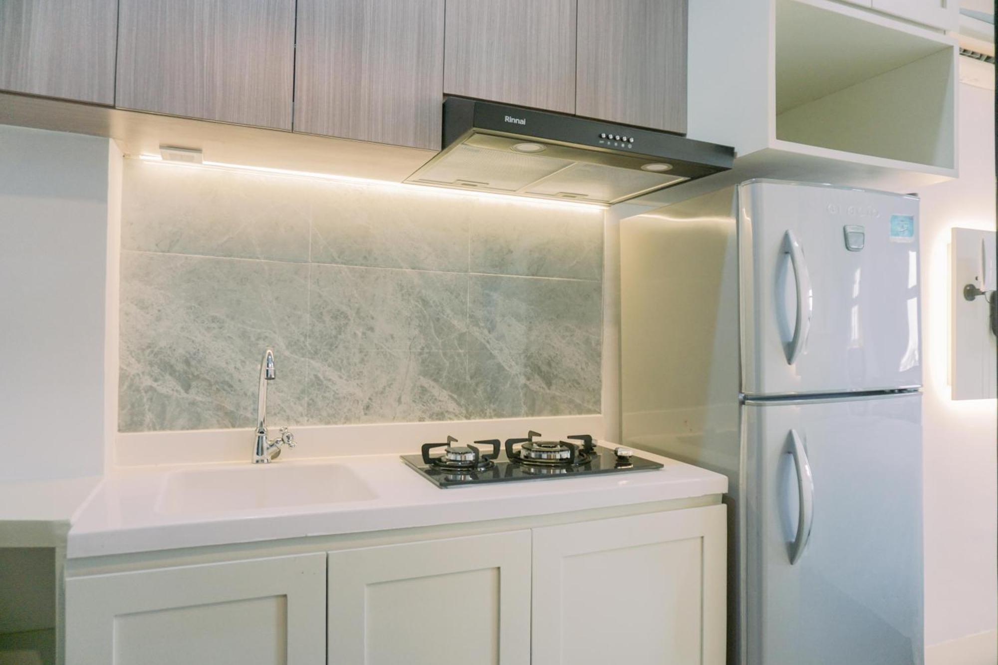 Homey And Cozy Belmont Puri By Travelio Apartment *