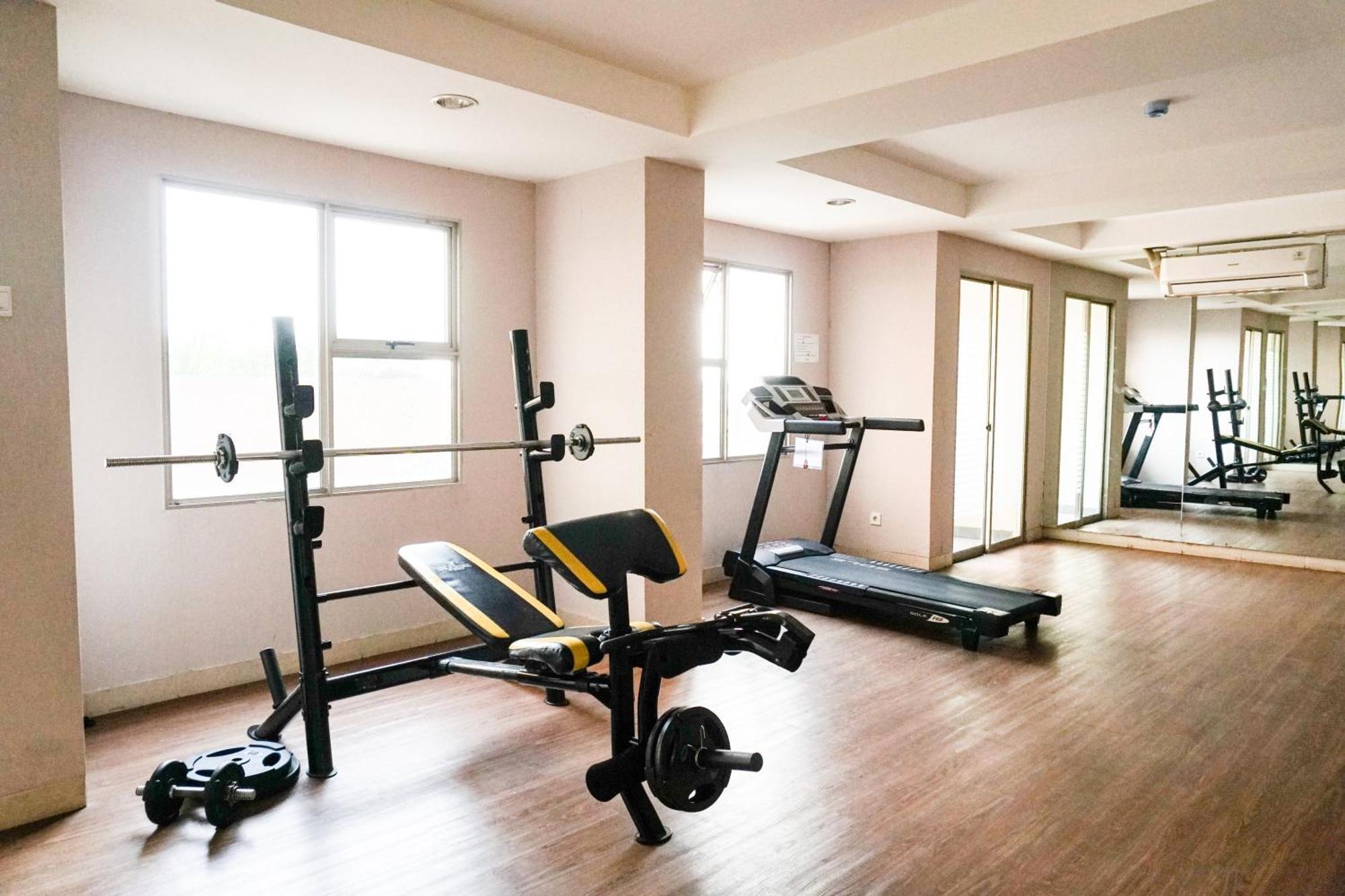 Apartment Homey And Cozy Belmont Puri By Travelio